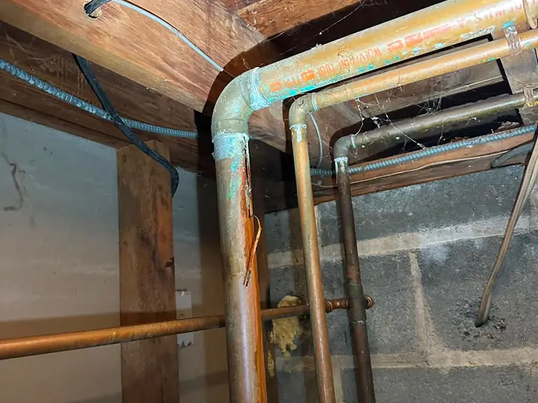 Corroded broken copper pipe before replacement — Lumin Drain NJ