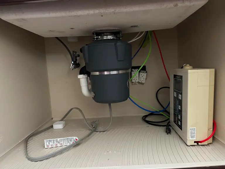 New garbage disposal installed under the sink — Lumin Drain NJ