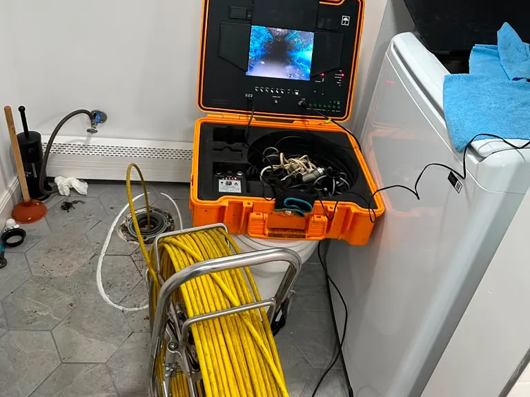 Push-rod sewer camera reel and video monitor ready for a drain line inspection — sewer camera inspection in Barnegat, NJ